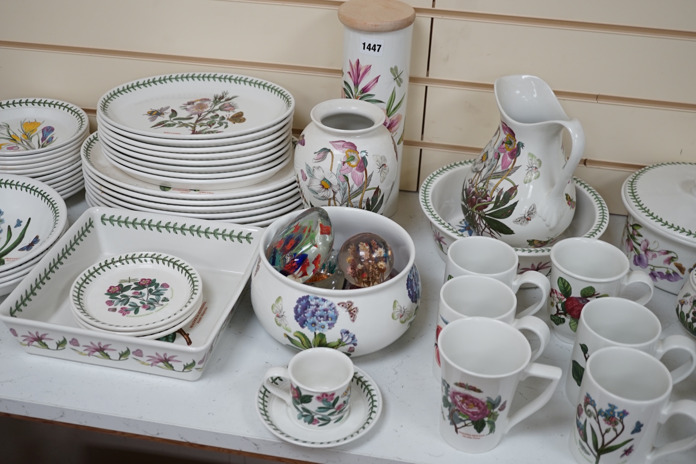 A large quantity of Portmeirion 'Botanic Gardens' tea, dinner and kitchen wares, together with cutlery and seven glass paperweights